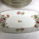 Limoges porcelain service decorated with flowers, mid XXth 57 pieces