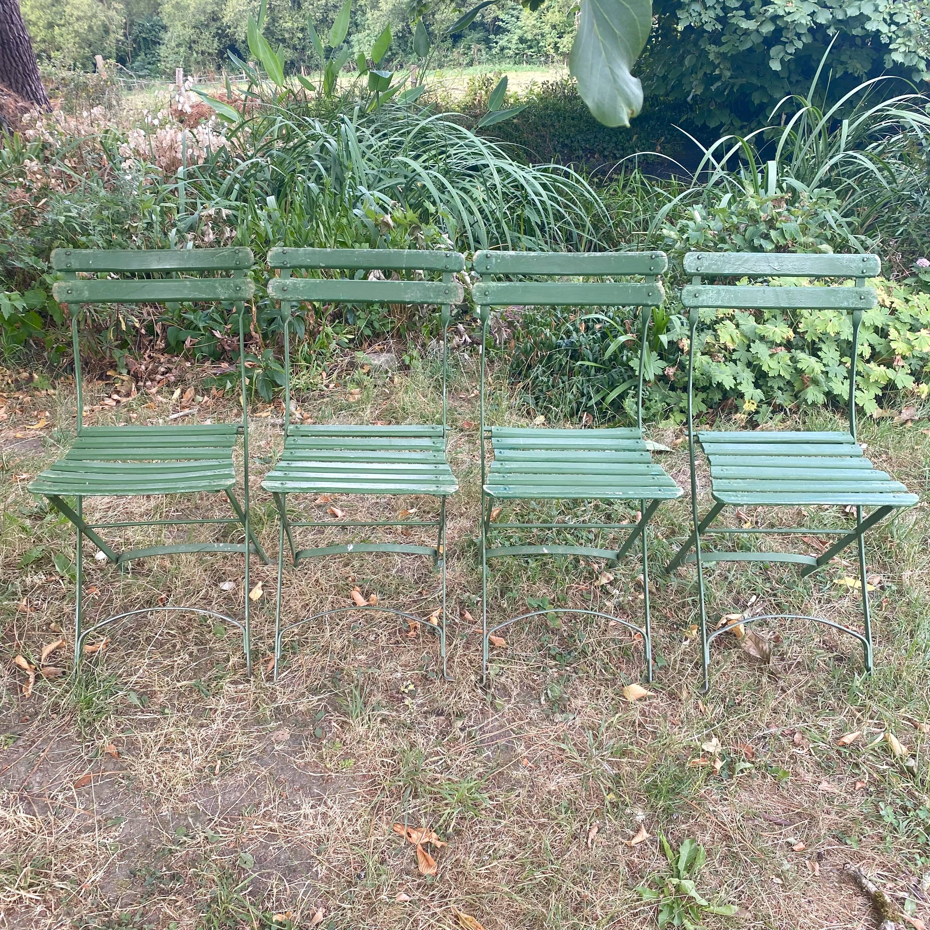 Antique folding garden chairs with wooden slats