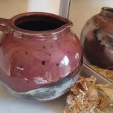 Stoneware pitcher by Matthieu Liévois in shades of red