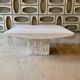 Square coffee table in honed travertine by Claude Berraldacci