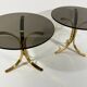 Brass and smoked glass side tables from the 1960s.