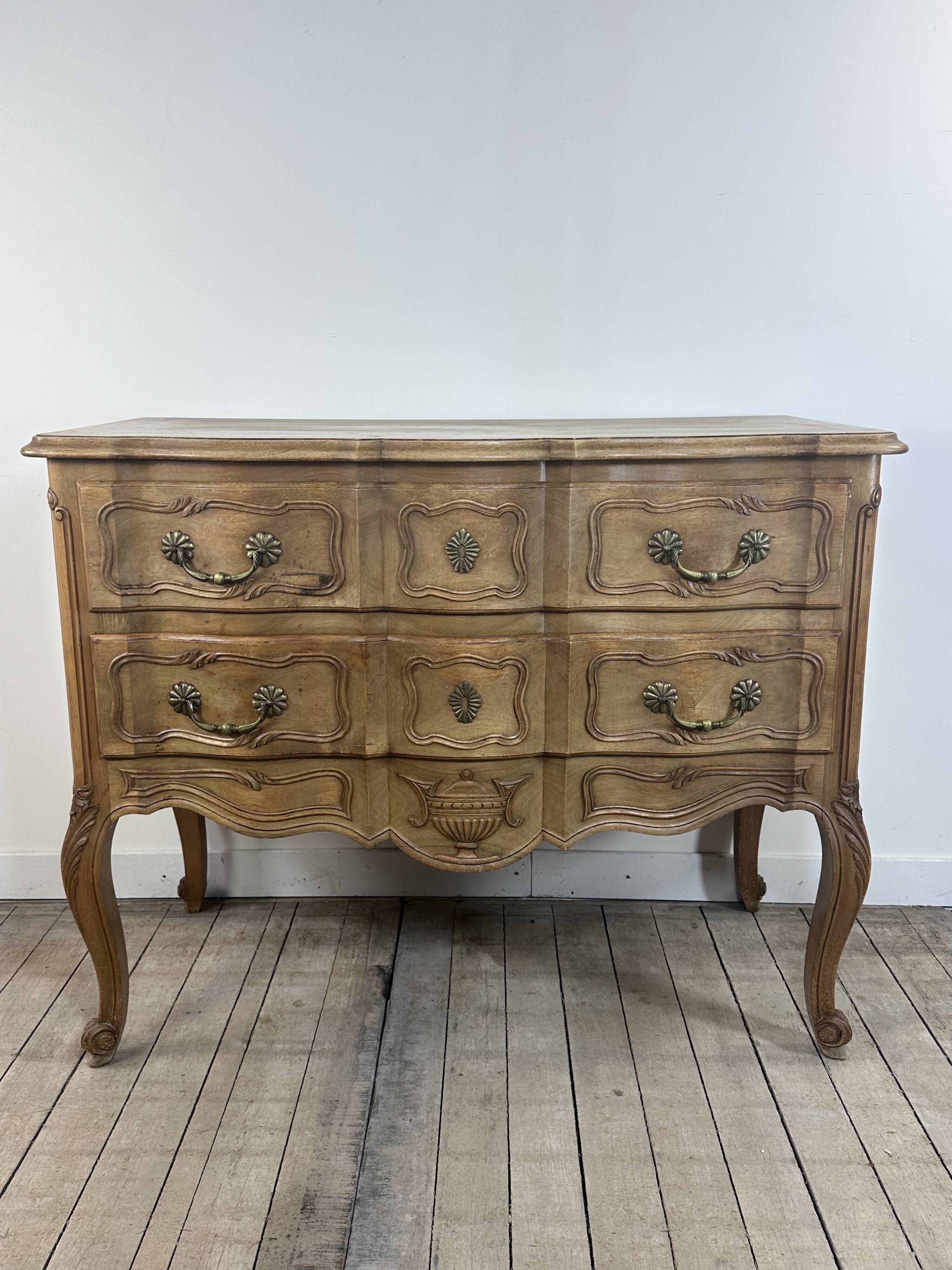 Louis XV style chest of drawers in carved wood