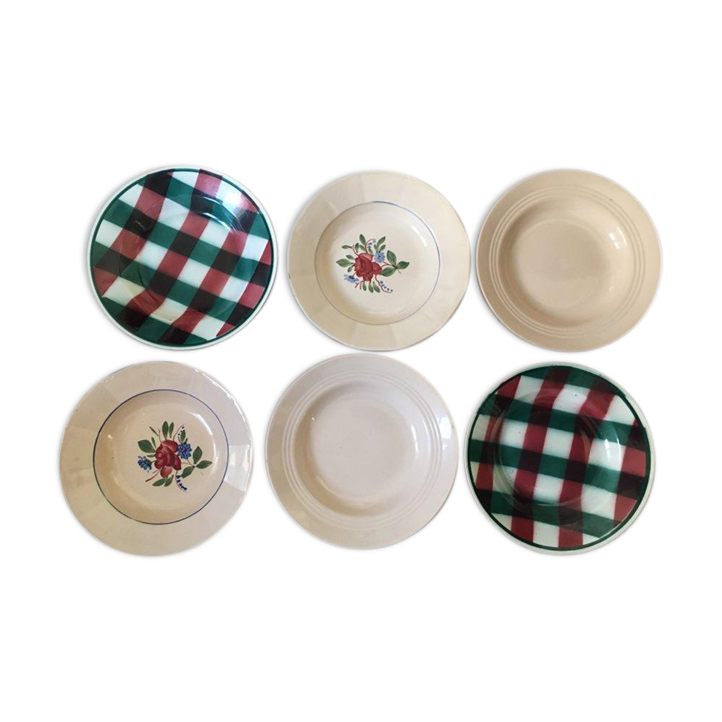 Matching old hollow plates in pink and green.