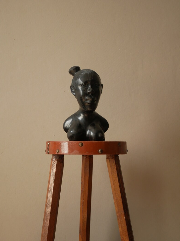 Bust of a woman in ebony African Art