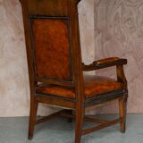 Restored antique Russian hardwood partner desk and leather armchair.