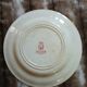 13 mismatched flat plates in ironstone