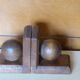 Paire de serres livre les boules en bois Art Déco