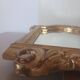Antique mirror in gilded wood.
