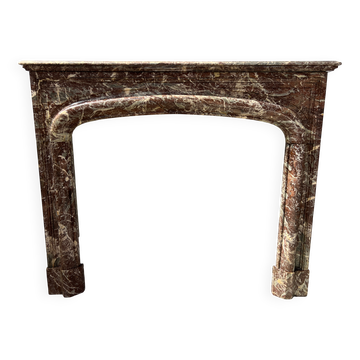 Louis XIV style fireplace in speckled red marble, 19th century.