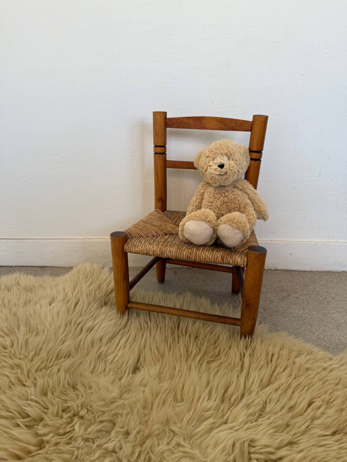 Vintage wooden and straw children's chair