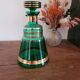 Green and gold glass carafe