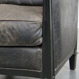 Black Art Deco design cow leather and wooden armchair with loose cushion