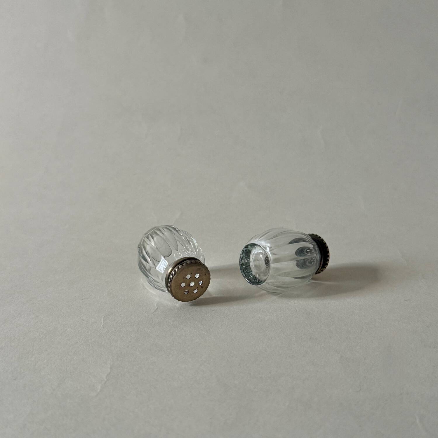 Pair of vintage Christofle glass and silver pearl salt cellars
