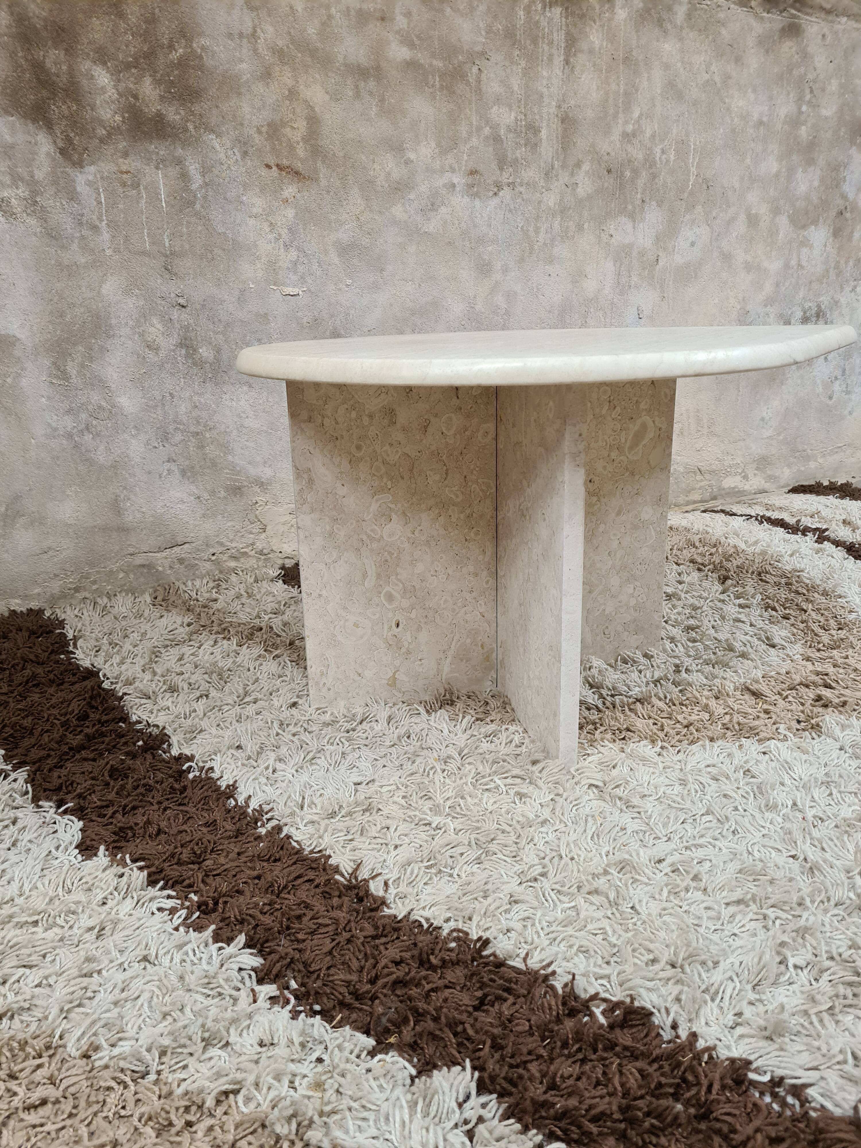 Travertine drop-shaped coffee table