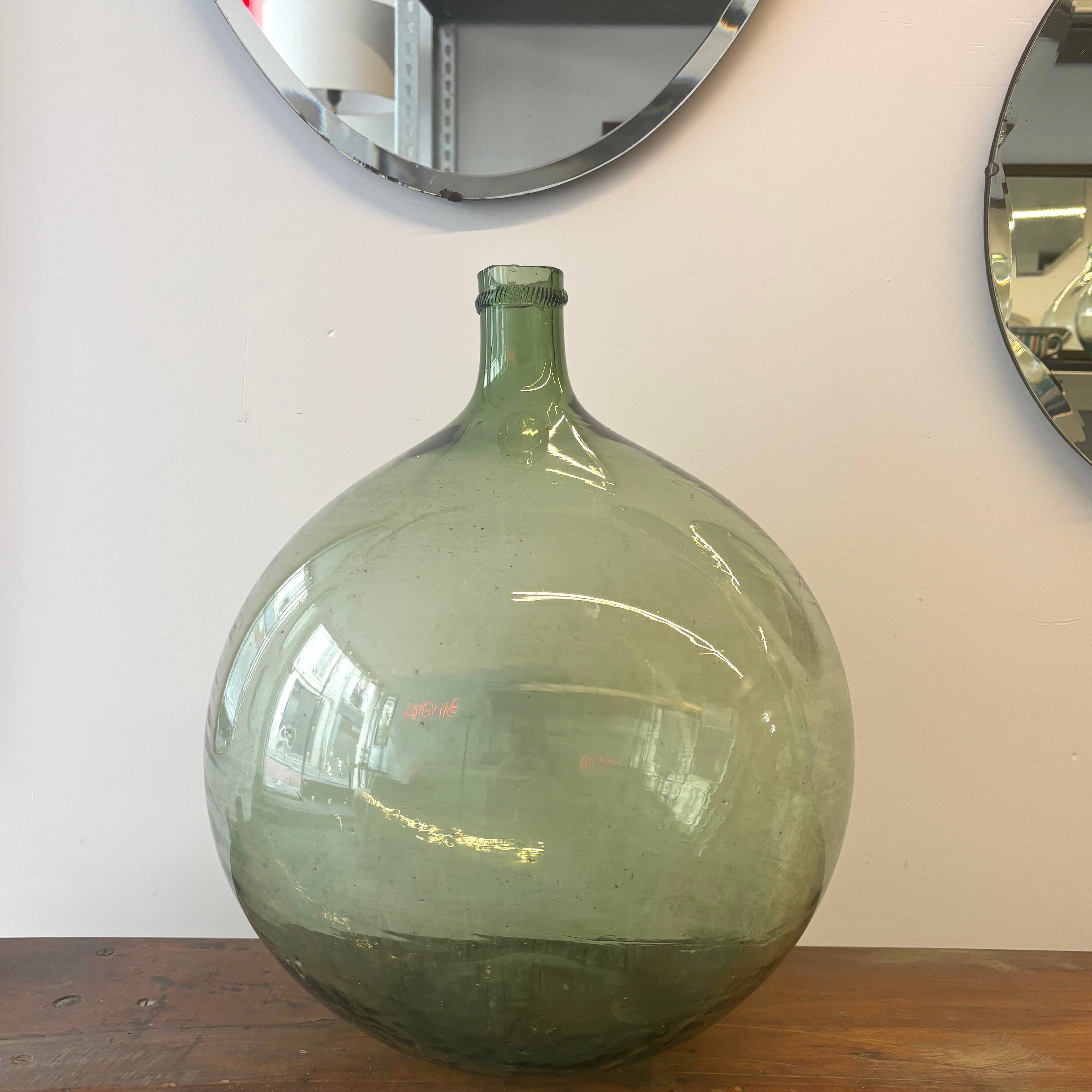 Fat demijohn in old blown glass