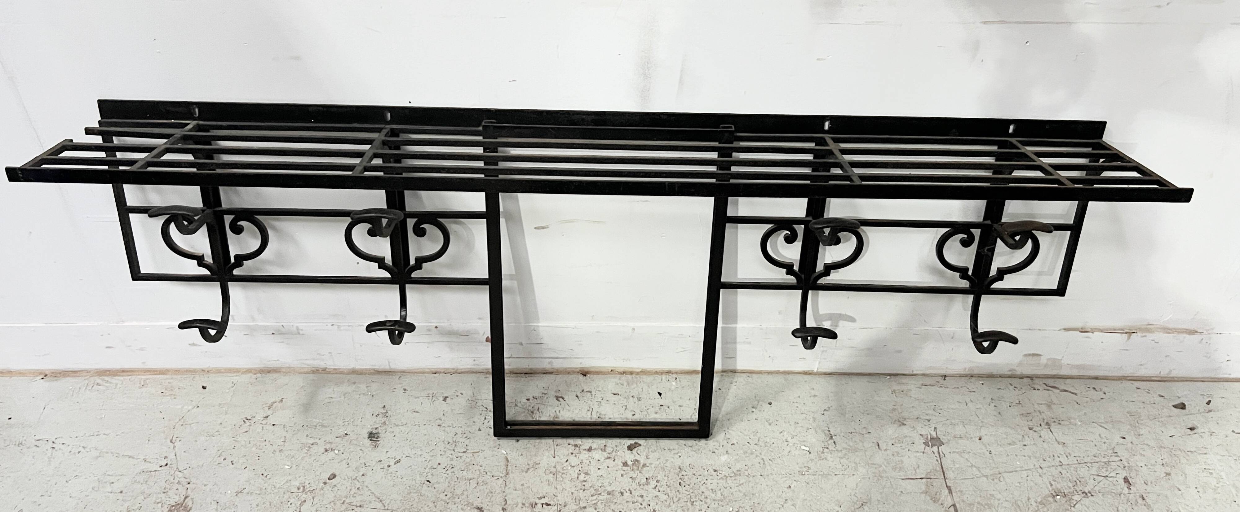 Art Deco wall coat rack in hammered wrought iron, 20th century.