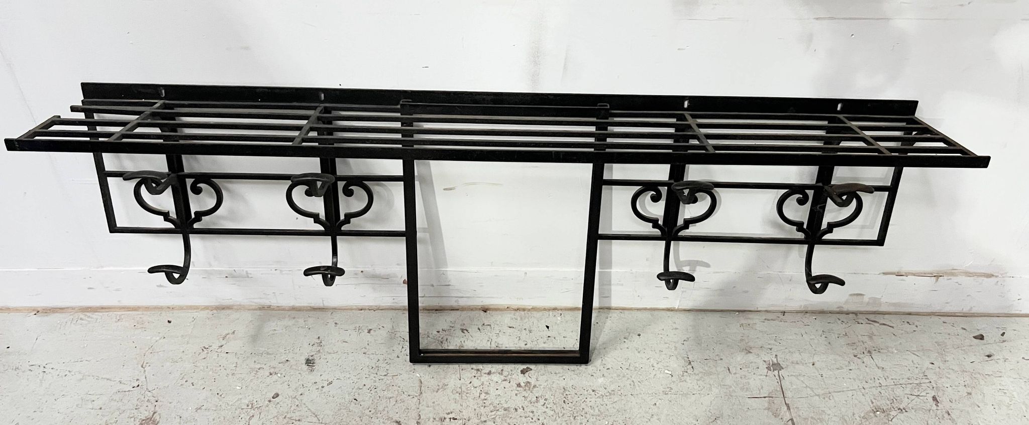 Art Deco wall coat rack in hammered wrought iron, 20th century.