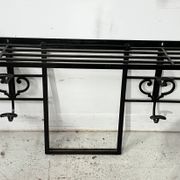 Art Deco wall coat rack in hammered wrought iron, 20th century.