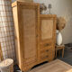 Asymmetrical wardrobe in raw wood