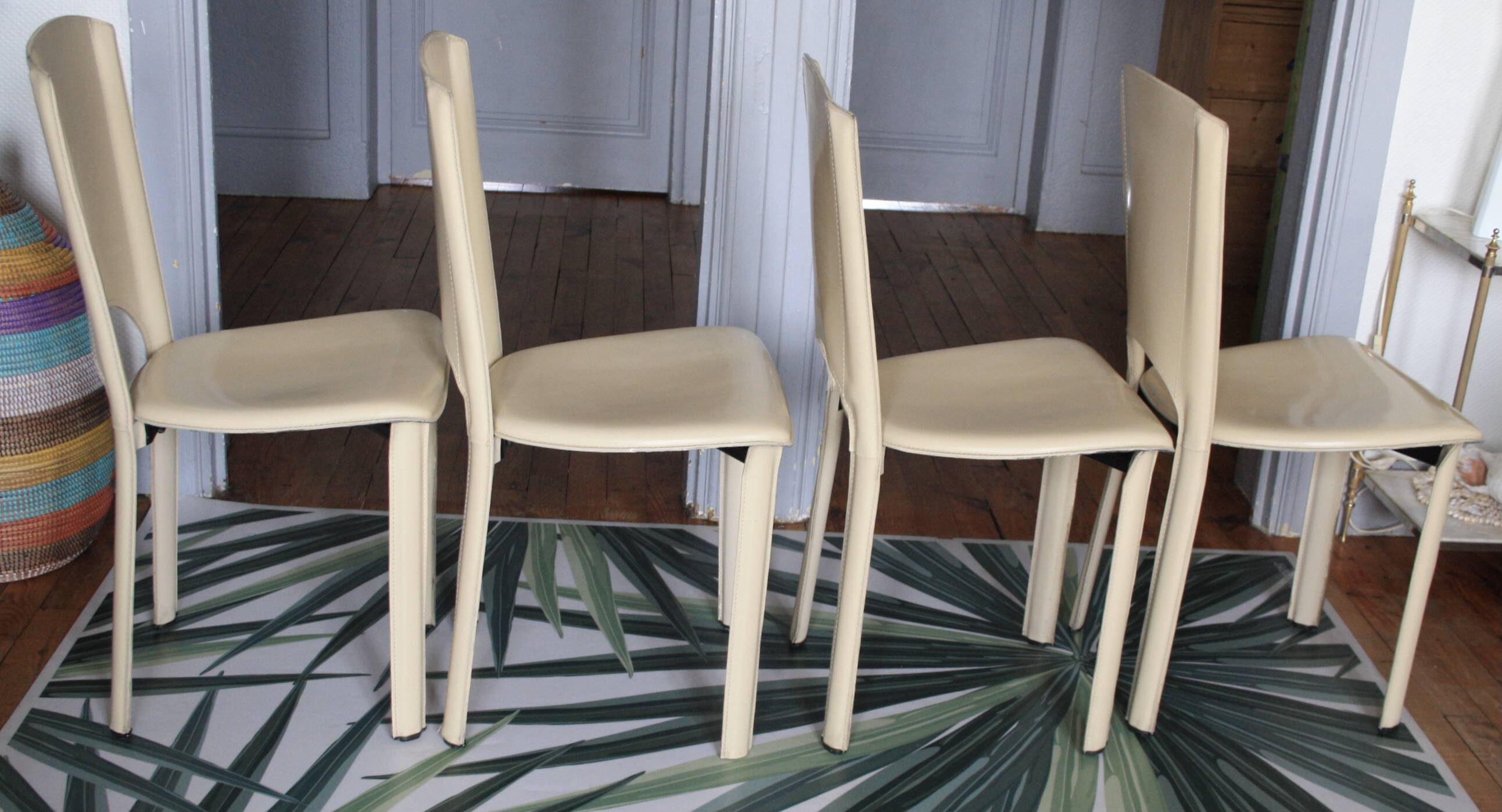 Set of 4 beige leather chairs from the 80s in Italy