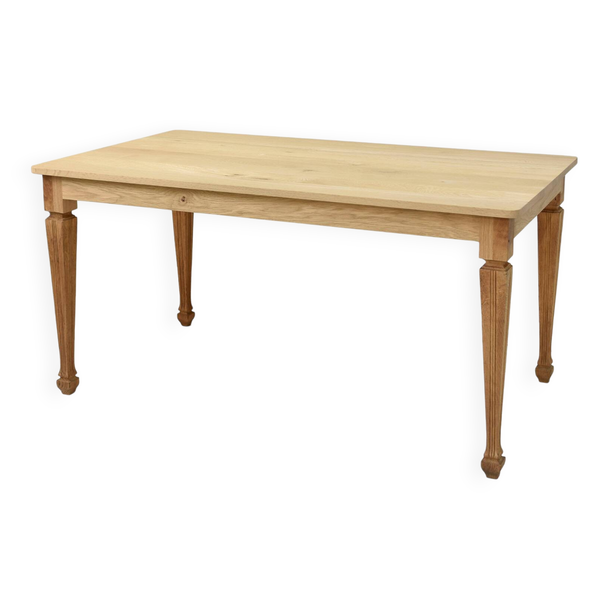 Vintage solid oak table with antique legs.