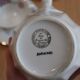 Coffee and tea service in Limoges porcelain with anemone flower pattern and gilding.