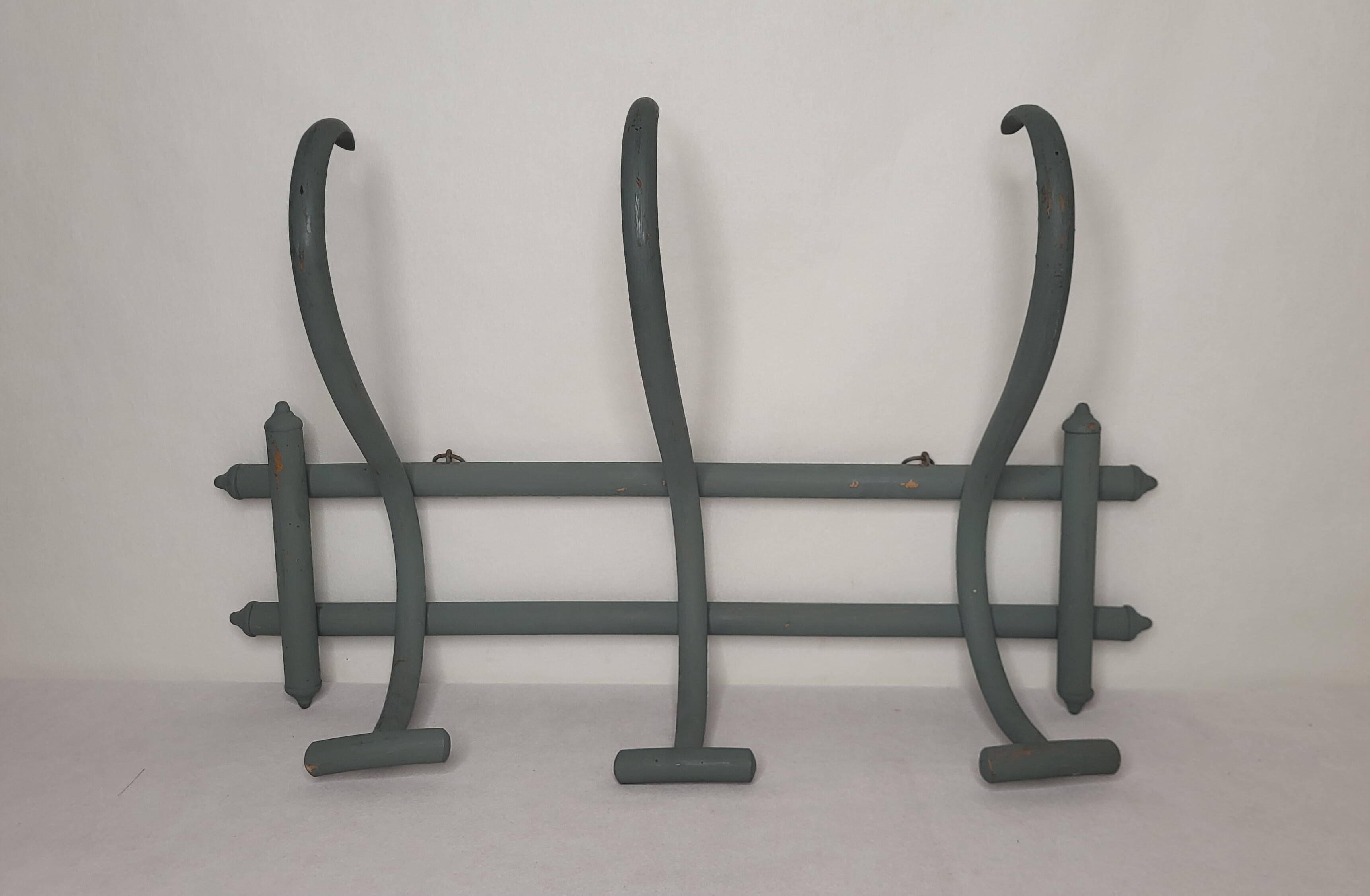 Curved wooden coat rack