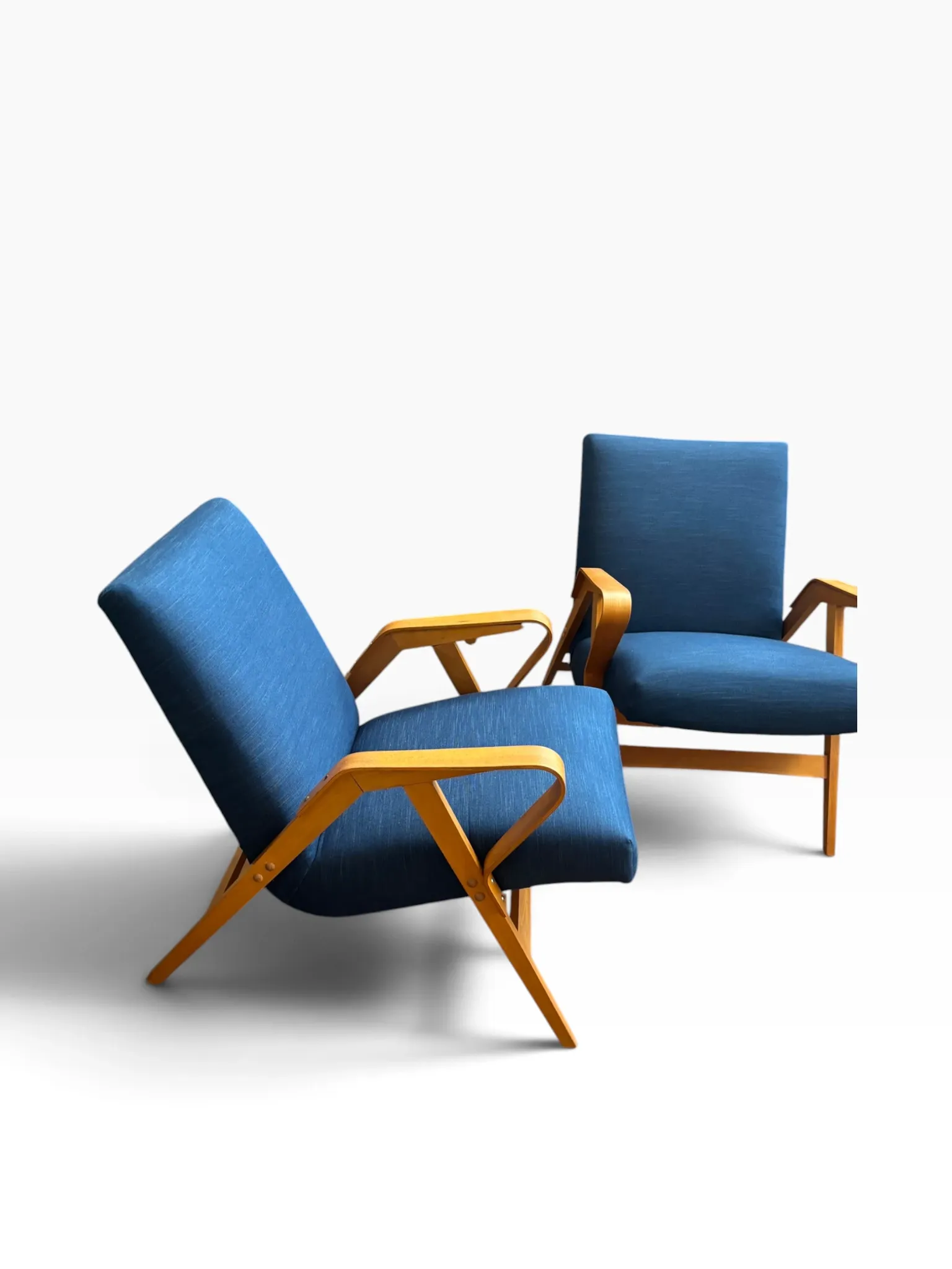 Set of 2 blue lounge chairs restored by František Jirák for Tatra Nabytok.