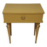 Old bedside table with compass feet