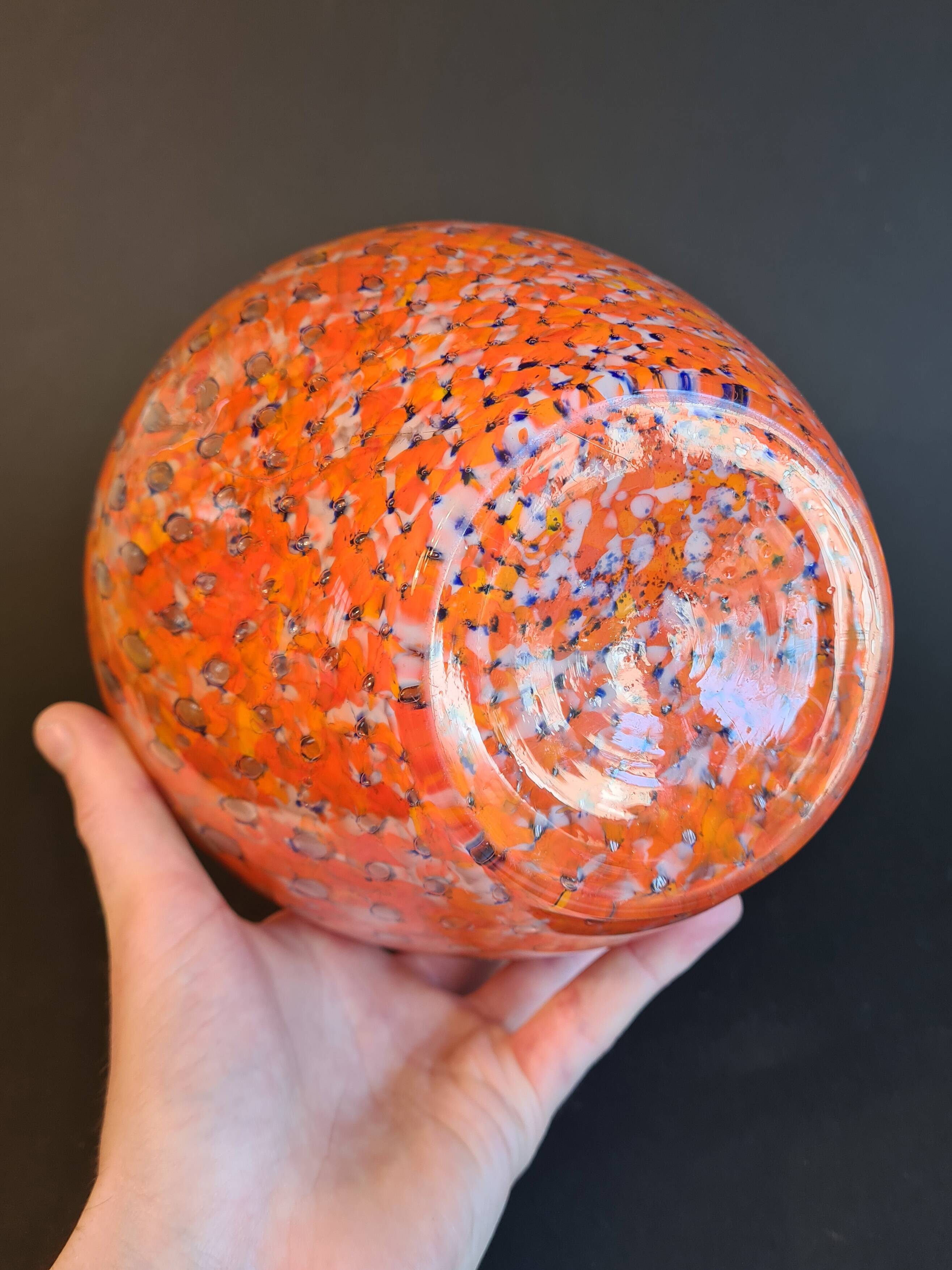 Shimmering orange blown glass vase