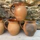 set of terracotta jugs country style