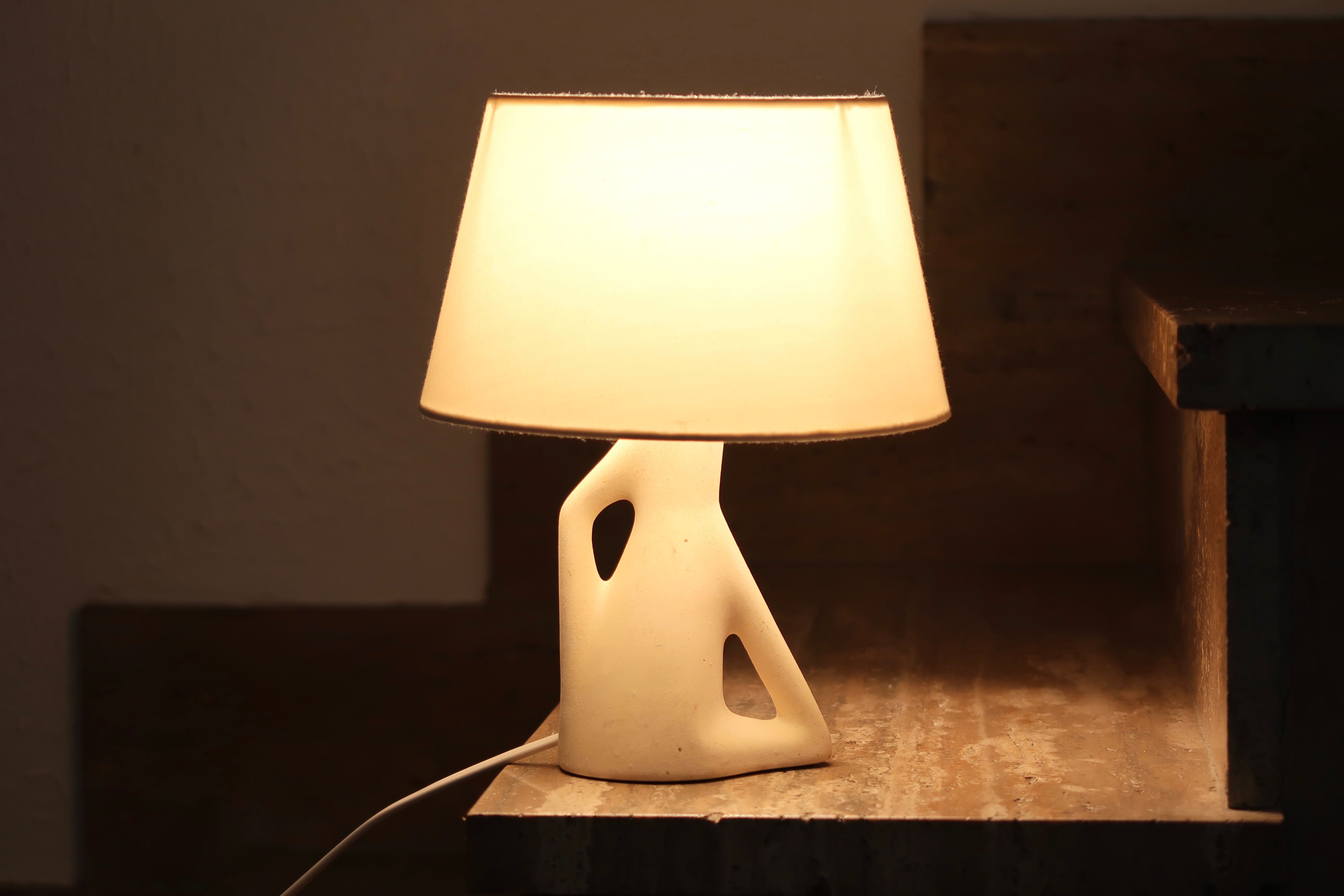 Pair of white ceramic lamps, 50s