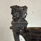 Patinated bronze vase with handles topped by bicéphalic busts, 19th century.