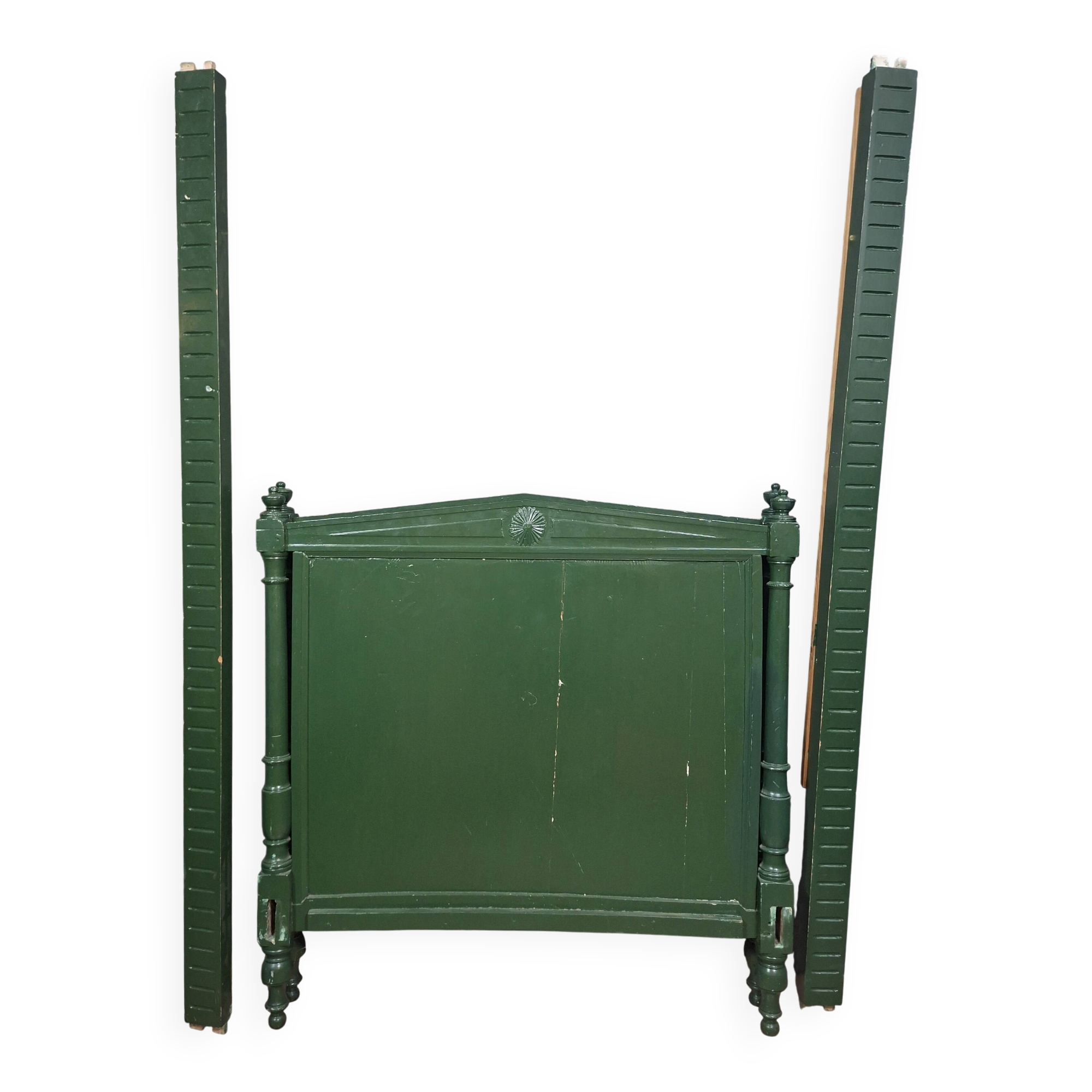 Directoire style bed in painted green wood.