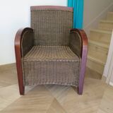 2 armchairs in woven rattan and wood, 1980s