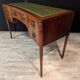 Art Deco desk in curved mahogany veneer.