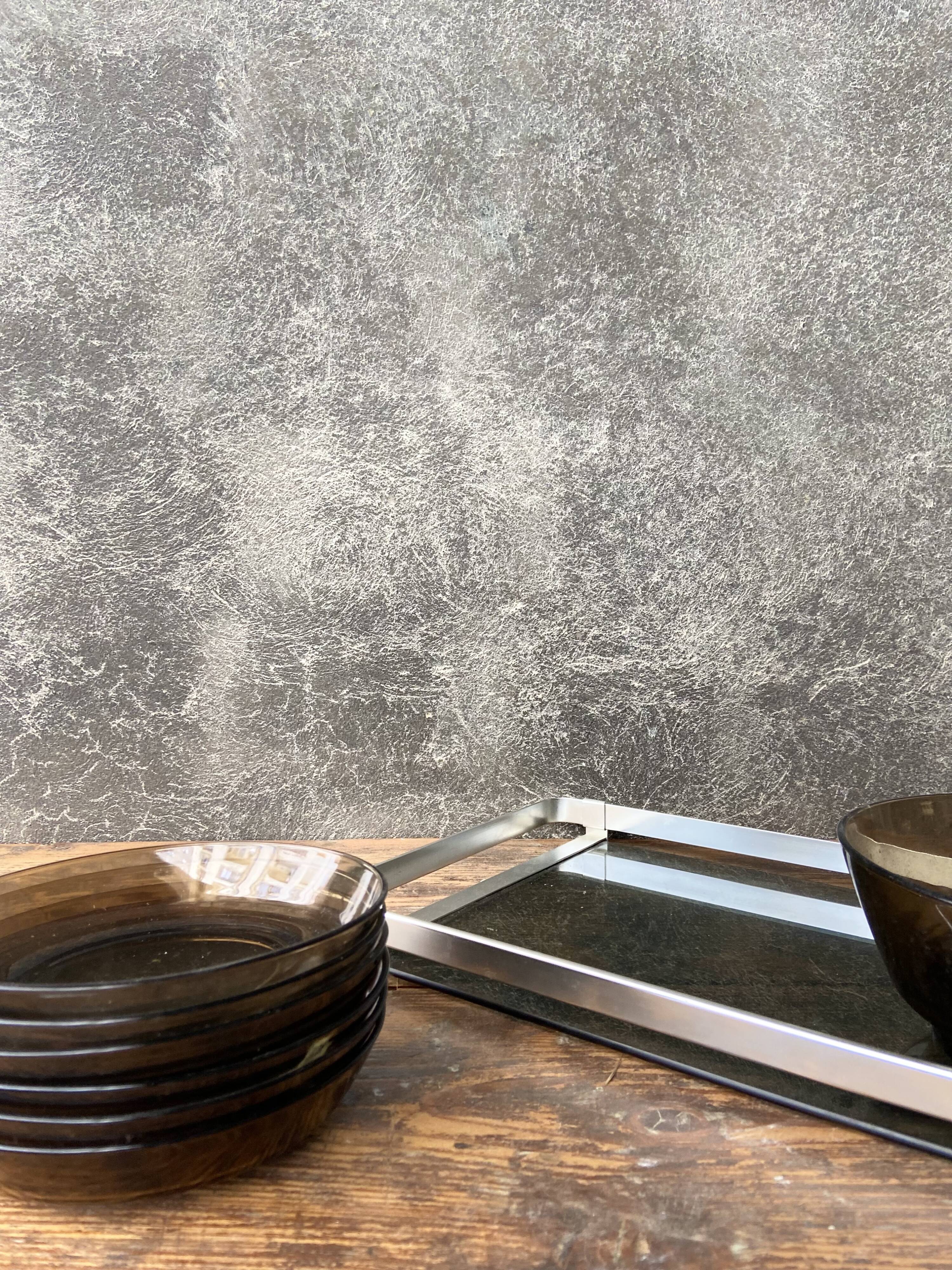 Top in smoked glass and steel