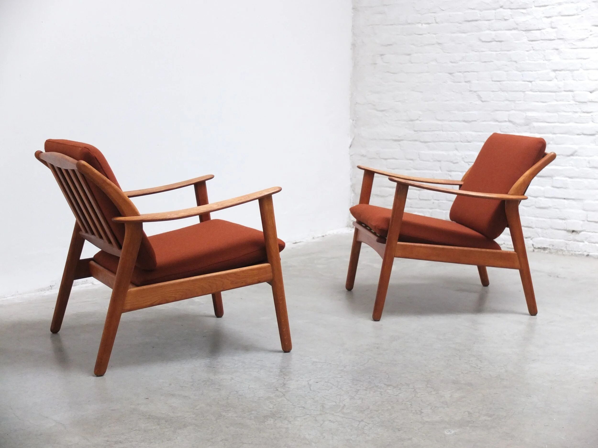 Danish pair of easy chairs in oak by Niels Koefoed, 1960s