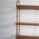 Etagere metal doré et tablettes en bois