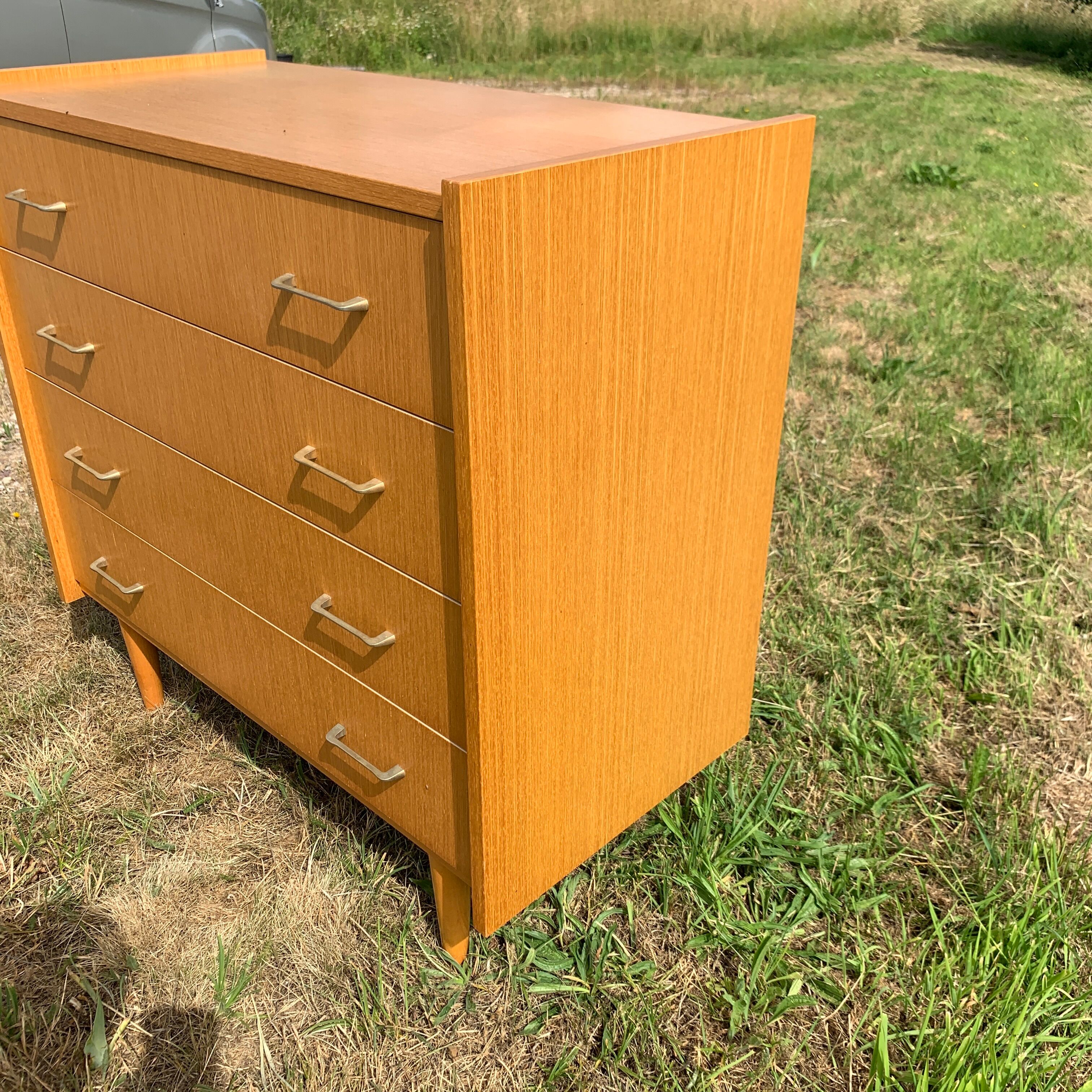 Commode 4 tiroirs vintage en aggloméré plaqué véritable bois