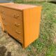 Commode 4 tiroirs vintage en aggloméré plaqué véritable bois