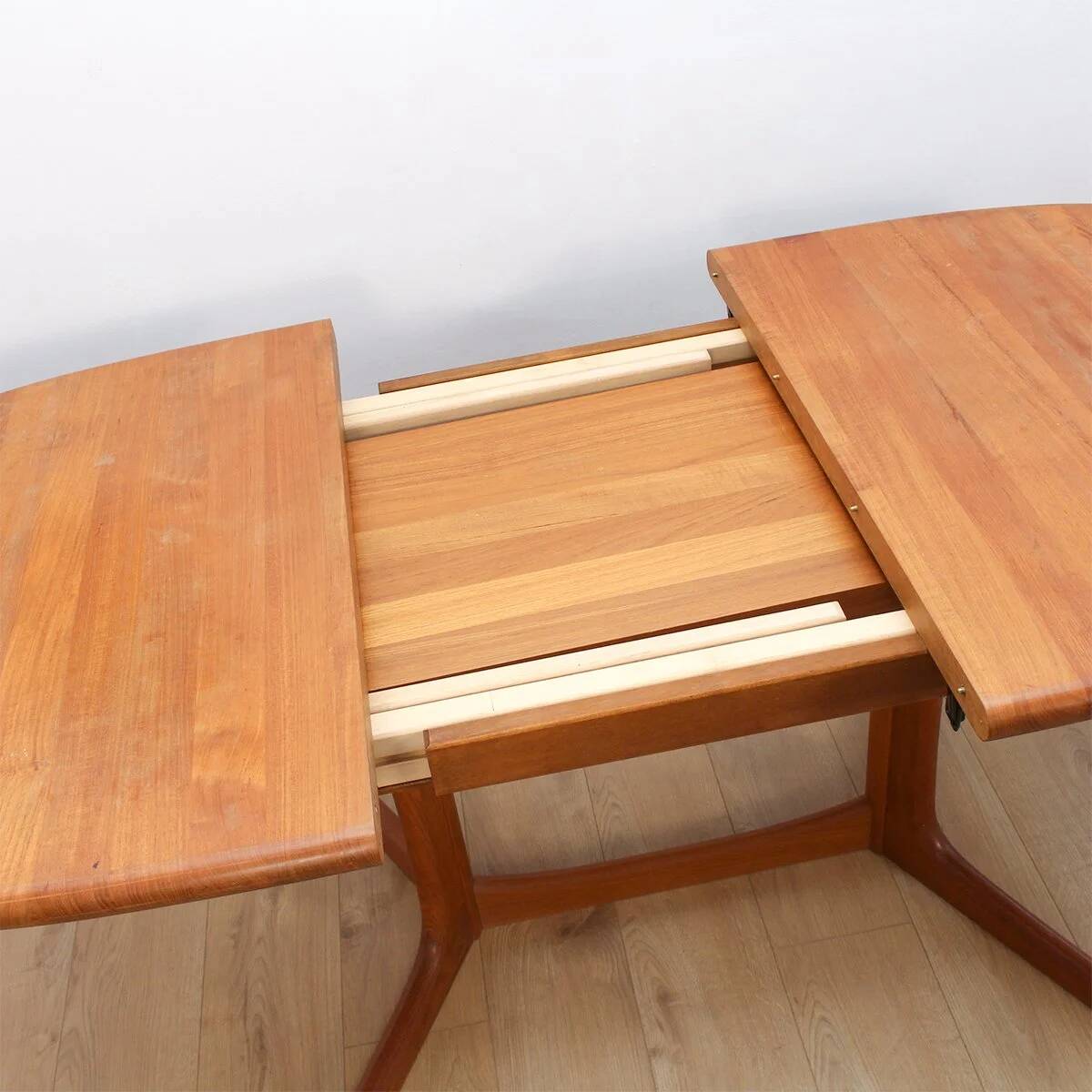 Teak dining table by Dyrlund