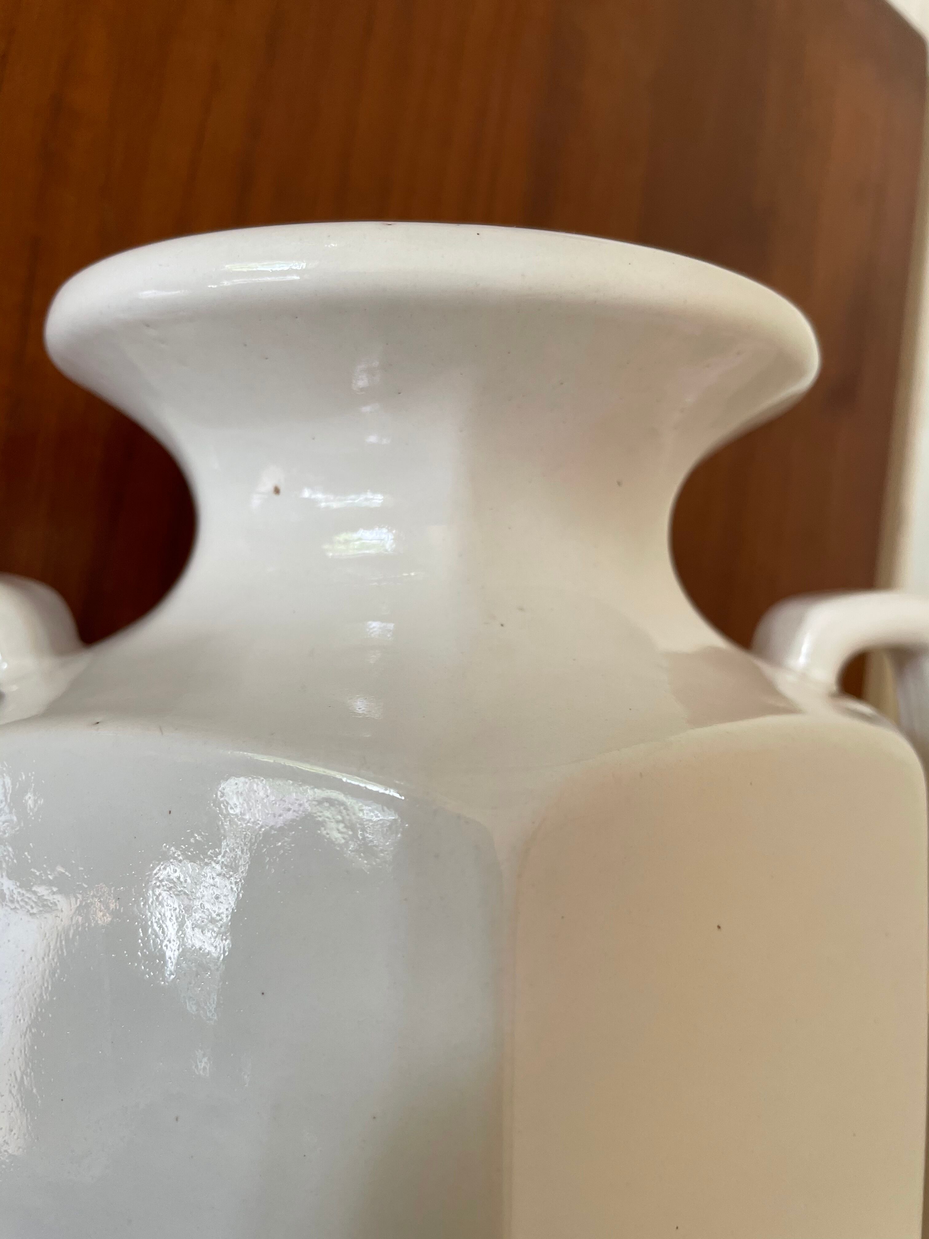 White ceramic ansé vase