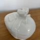Pair of porcelain egg-shaped pocket trays