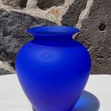 Blue polished glass vase.