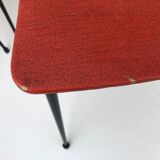 Red metal chairs from the 60s