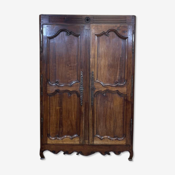 Louis XV cabinet façade in nineteenth century walnut.