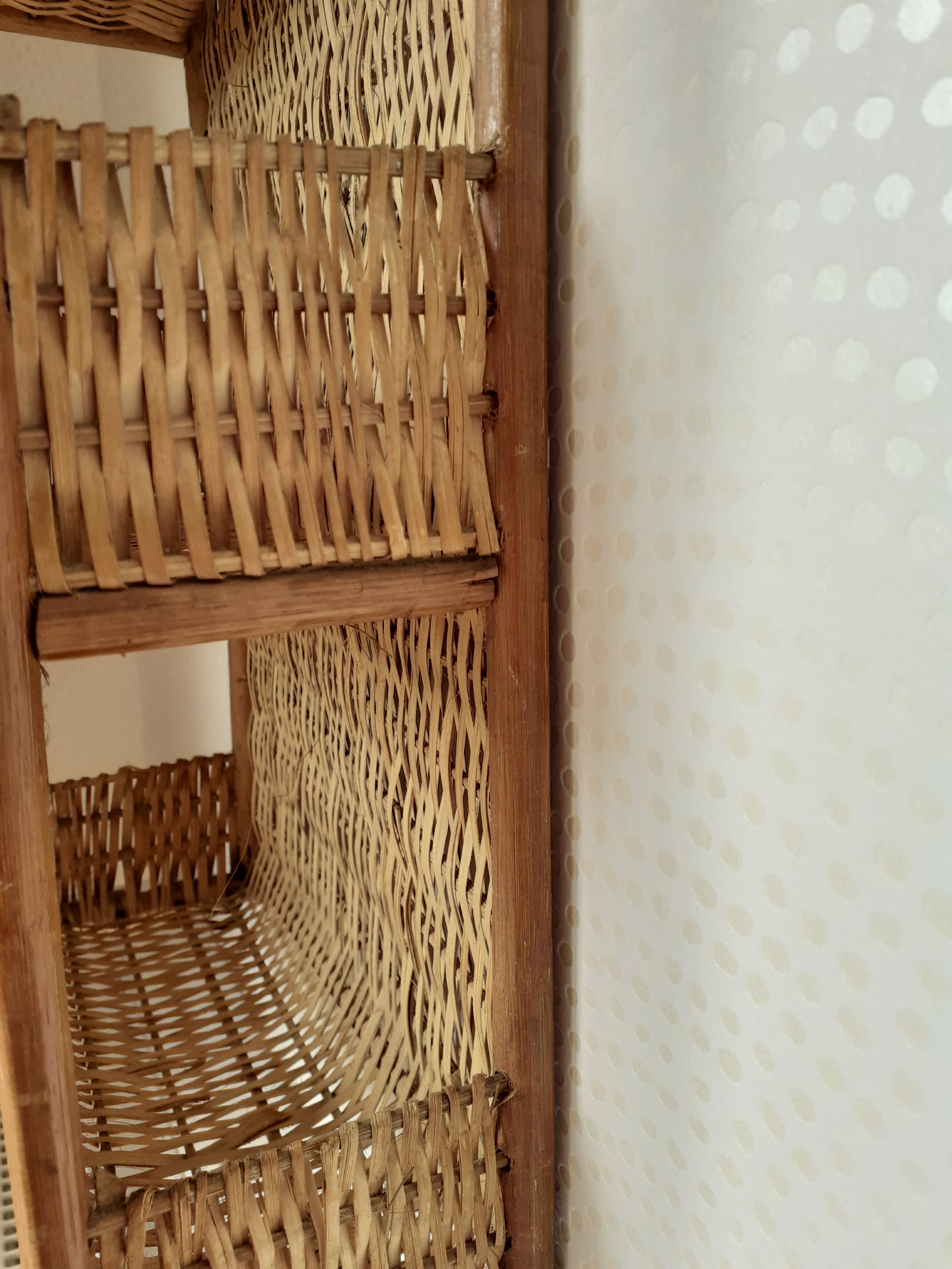 Rattan and wicker wall shelf