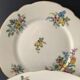 6 flat flowery plates in Limoges porcelain