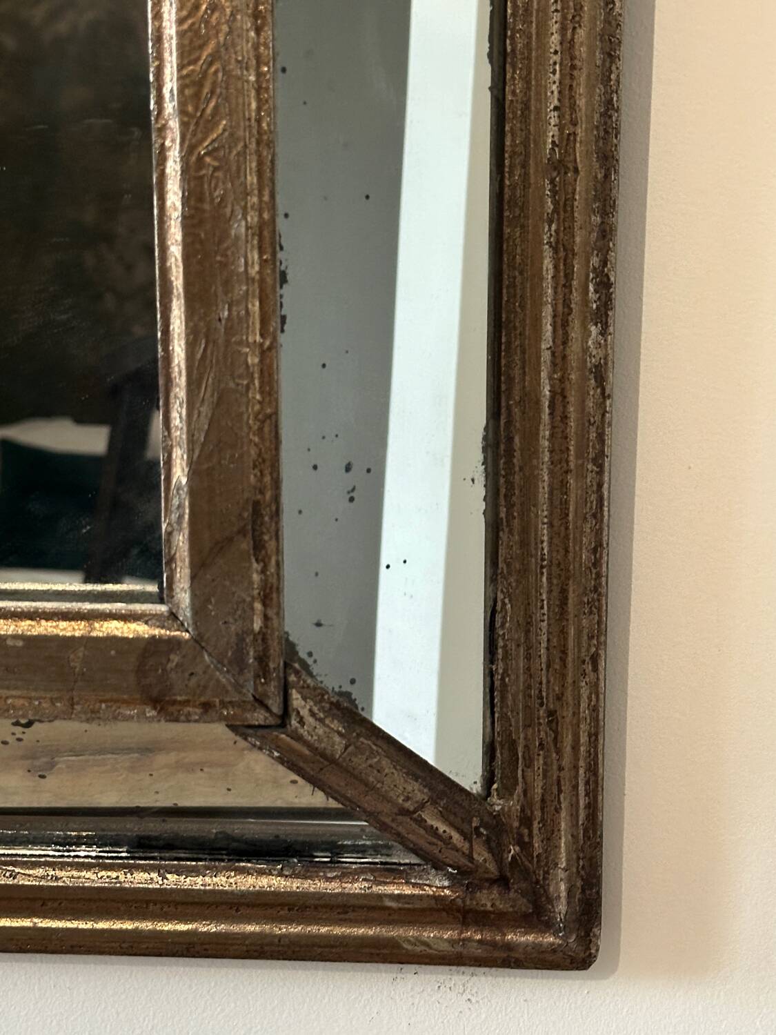 Antique mirror with wooden ornaments